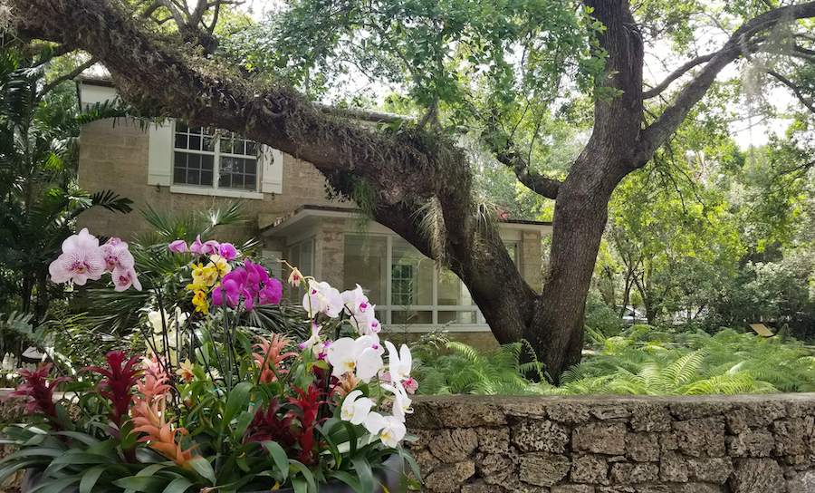 The Gate House surrounded by orchids at the Fairchild Tropical Botanic Garden